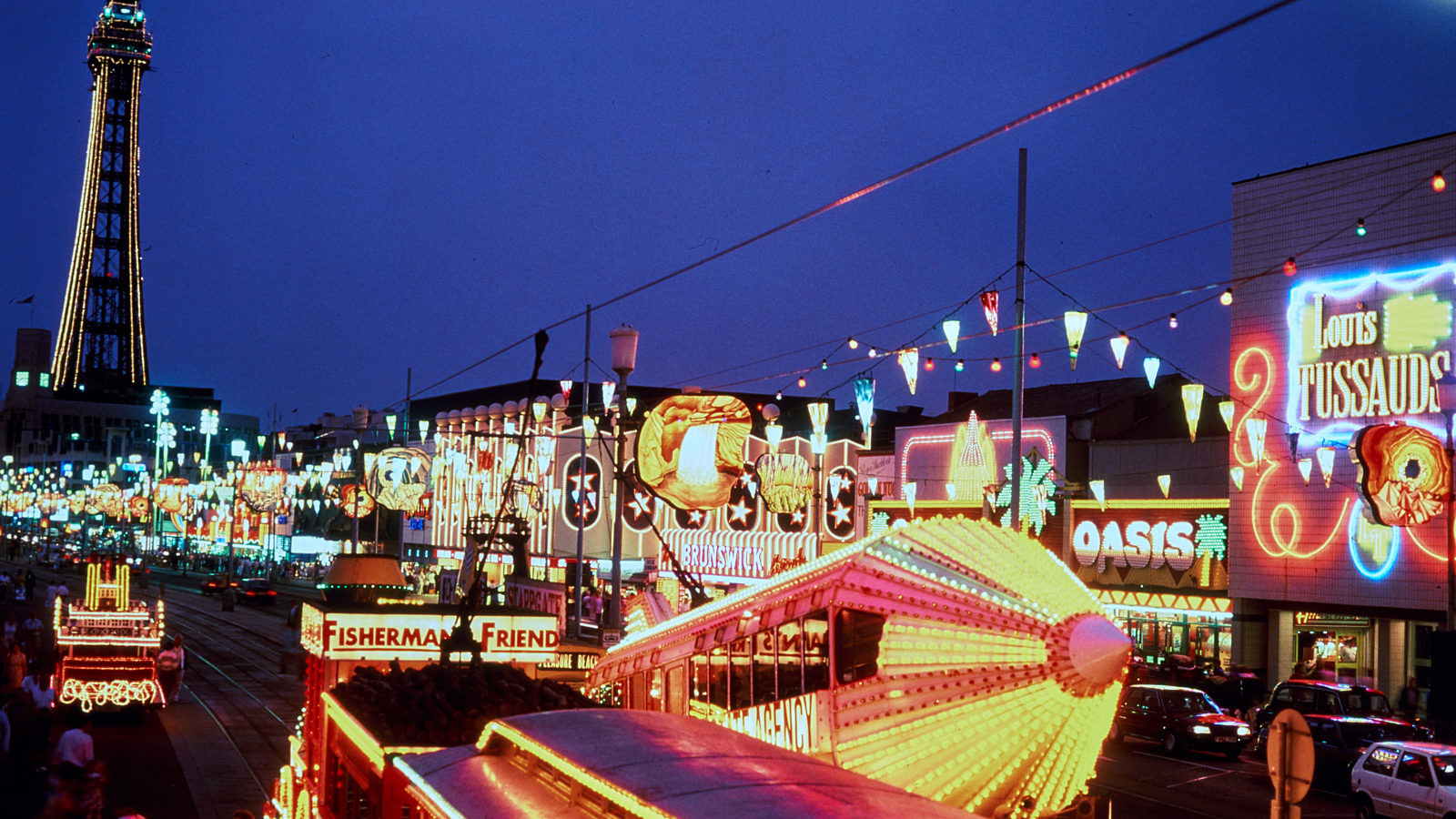 A photograph of illuminations lighting up the Prom with the tower lit up behind