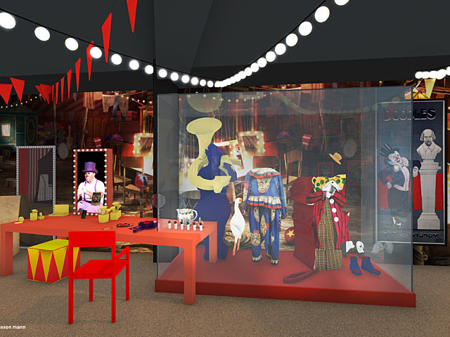 A visual showing the roll up, roll up gallery featuring a display case with costumes