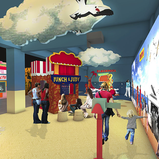 A visual of the Gallery, Beside the Seaside with a sandy floor and a Punch and Judy booth