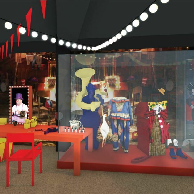 Image of the Roll Up Roll Up gallery showing circus costumes in display unit.