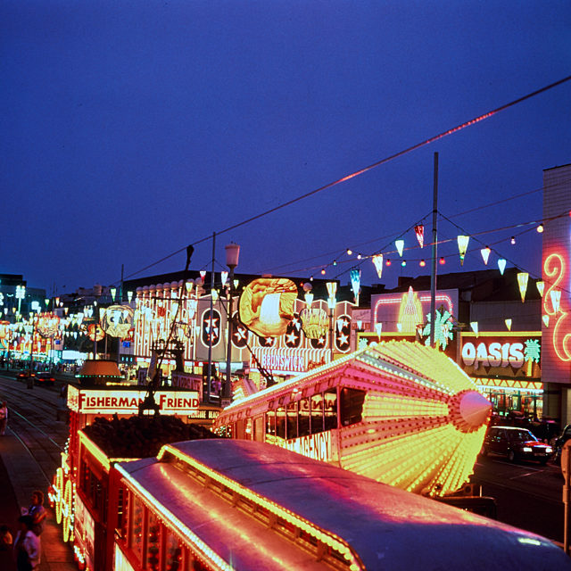 A photograph of illuminations lighting up the Prom with the tower lit up behind