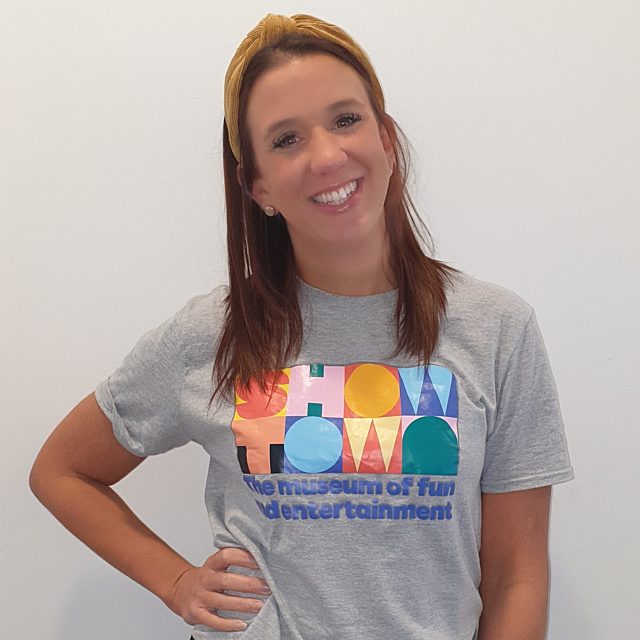 Leanne smiling in a Showtown t-shirt.