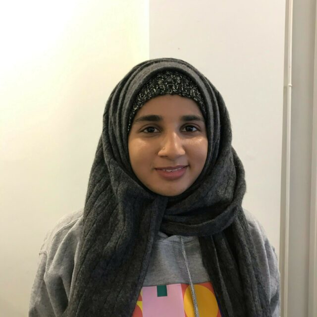 Naila wearing a Showtown hoody